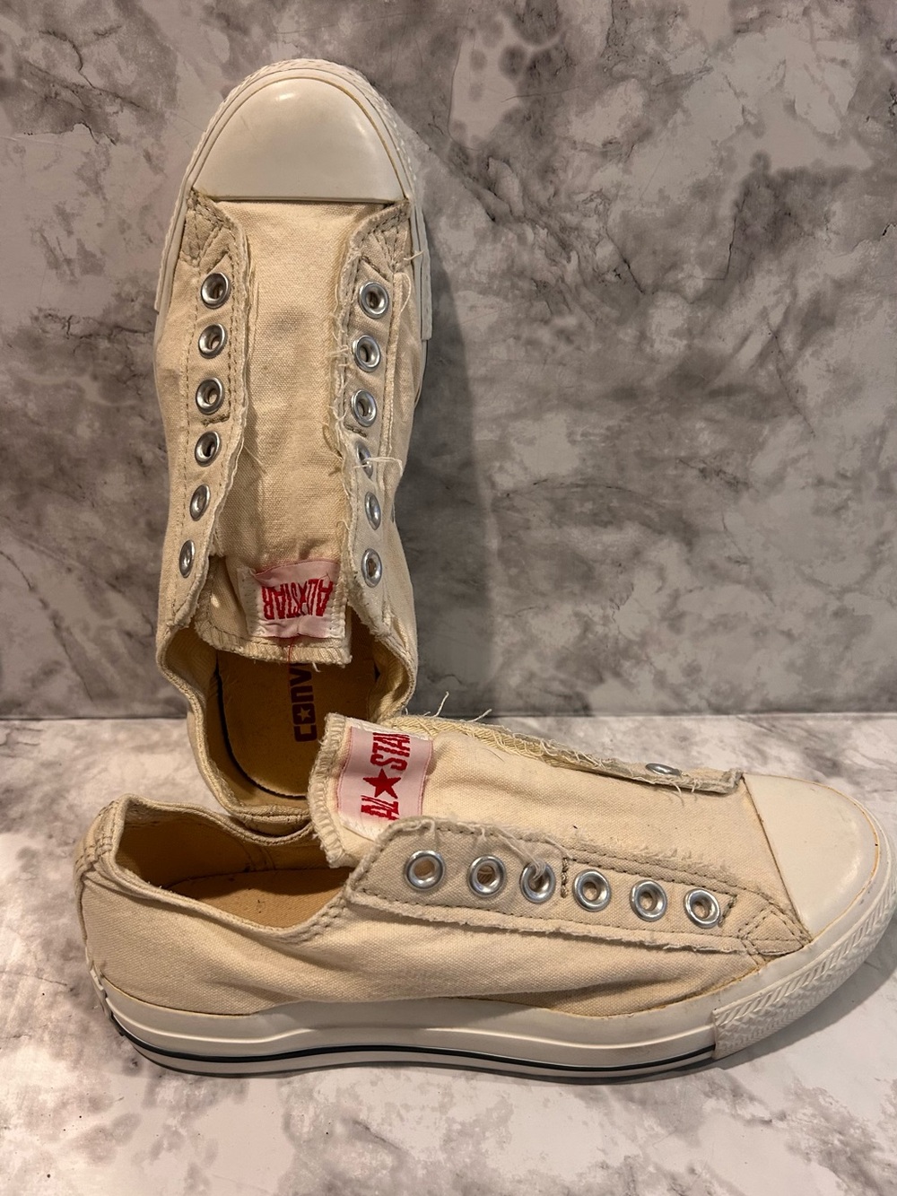 Converse Canvas Slip-On Sneakers in Off-White/Natural with Red Logo